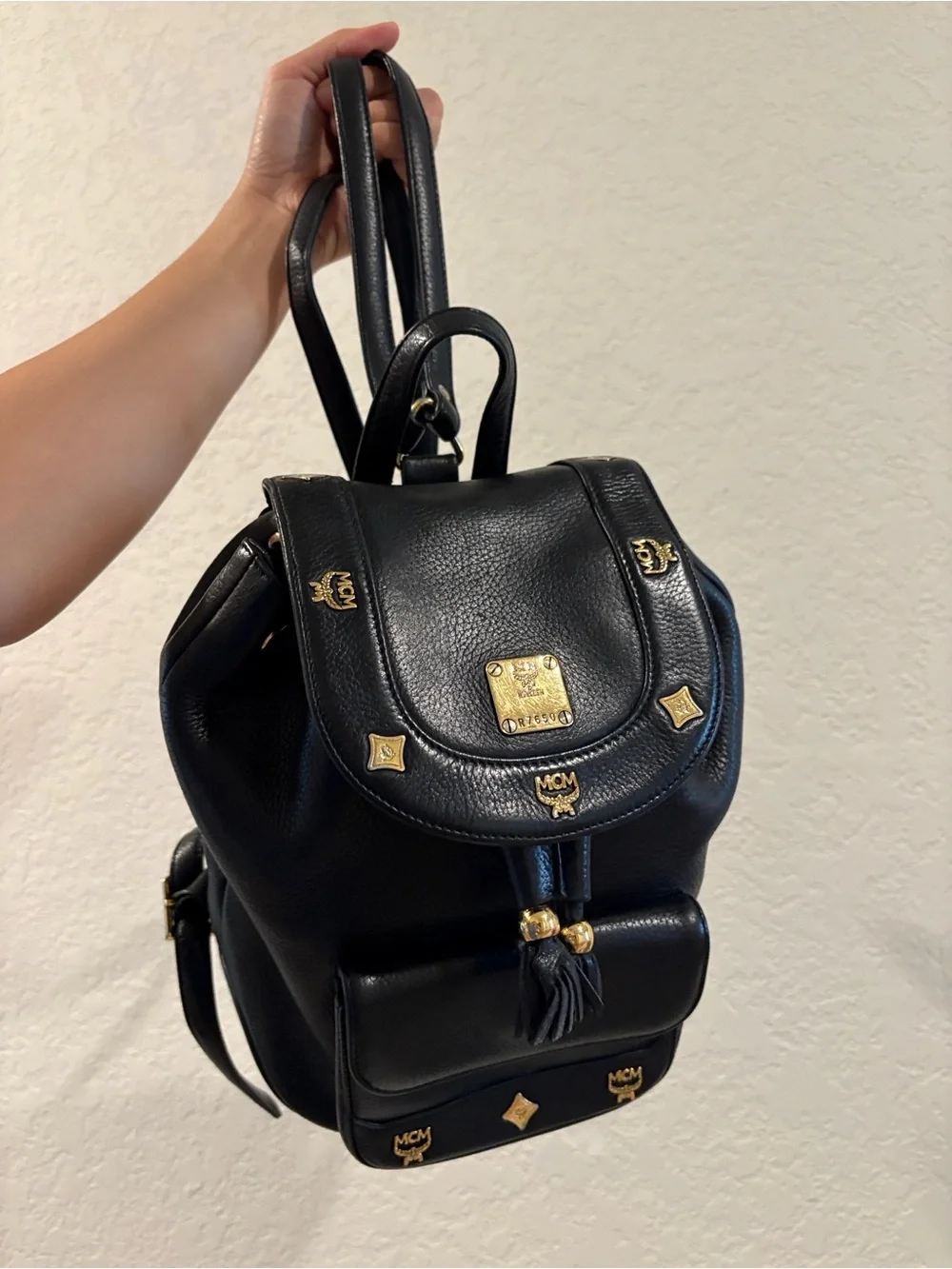 MCM Black Leather Drawstring Backpack with Gold Hardware